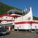 Even the airport pays homage to the flying fish by including a flying fish boat in its design. Note the curved area above the first floor.