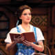 Another Broadway shot shows they changed from a blue dress to more of a two-piece look with a bustier and skirt. The apron does not tie over the dress, but rather the bustier extends past it, so it looks like it's sewn right into the costume. They