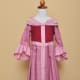 Front view. The contrast pink stripes were doubled strips of fabric sewn right on to the front of the dress. Whether you use a v-front pattern or one with a rounded waistline, you can place the strips at an angle to create the look of a v-shaped wais