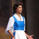 Here's a shot from the Beauty and the Beast show at Disney's Hollywood Studios in Florida. The theme-park implementation of this dress is rather flashy. They use a very bright shade of blue in a shiny fabric that appears to be some kind of satin. Th