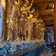 There were 16 "saints" when Buddhism came to China from India, but over time China added two more of their own, and now there are 18 Luohan - Saints. They are shown surrounding the Buddhas in the main hall of the temple, and like the saints of Chris