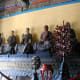 The luohan are lined up, nine to a side.