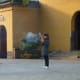 A woman praying at a temple in Suzhou.