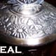 The stamped details of this lid are crisp and well defined. The silver lays smoothly on the metal with no signs of pooling, and with a nice patina.