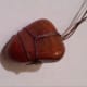 This stone is actually a Lake Superior Agate, but I have created a nylon cord nest for it using the same technique.