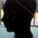 Ceramic head modeling an elastic headband.
