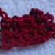 Photo shows 3 rows done. The loose ends of rows 1 and 2 are fastened off while that of row 3 is not.