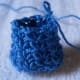 Photo shows what happened after about four rounds of ps. This is my inspiration for making the pineapple amigurumi. ",)