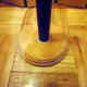 Broom handle cut to length on wooden circle and glued