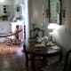 Space outside of kitchen, next to sunroom and living room