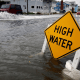 Water high enough to make streets inaccessible.