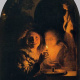 Lovers lit by a candle