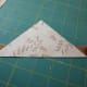 2. Center the strip to the diagonal cut and sew together, using a 1/4" seam. Sew the other triangle to the other side of the strip.