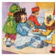 Raggedy Anne playing with other dolls