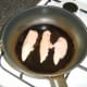 Gently frying chicken breast strips