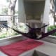 Here's one of the corner cat hammocks I made now in use at the Hawaiian Humane Society Cat House. Cats LOVE hanging out in these hammocks. :)