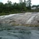 Flowing over rocks into the Lake