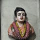 A bust of Swami in the temple.