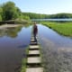 This me on the stepping stones that stretch out across the lake.