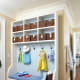In less than 2 ft. deep 6 ft. wide you can create this unit. Includes bench, drop down cupboard, coat hooks & baskets.