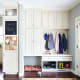 A combination of closet, cabinet, drawers, hooks and shelves. This is my favorite idea. Everything works and it still looks neat.
