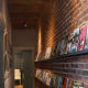 I love this idea. Use long shelves to create a display space for books.
