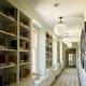 Most don't have hallways this long, but we can use this idea of shelves and drawers with windows in between.