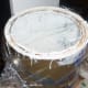 Place a layer of plastic wrap on top of the can before sealing.