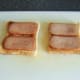 Fried Spam slices on toast