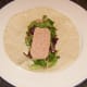 Spam and salad leaves arranged on wrap