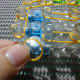 Step 4a: Now we are going to place a rubber band in this space between the pegs. But, since the bands placed usually have one band above it on one side and one band below it on the other side, it is not as simple as placing the band as is.