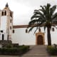 Betancuria in west central Fuerteventura, was the historic first settlement of Spanish colonialists, founded in 1404, and once capital of the whole Canary archipelago. This is the 17th century Church of St Mary