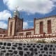The Faro de La Entallada is a lighthouse built in 1955 with a Moorish design influence perched at the top of a hill near the east coast village of Las Playitas. The route up is a bit scary, but the view is worth it