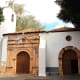 The decorative entrance of the 17th century Iglesia de Nuestra Senora de Regla in Pajara is believed to exhibit Aztec influences brought back by Spanish conquistadores, including sun, snake and jaguar depictions