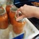Step 23: Put rings on each of your jars, but tighten the rings only until you get a little bit of resistance.