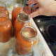 Step 22: Top each jar with a lid.