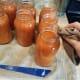 Step 21: Using a damp cloth, wipe the rims of your jars clean.