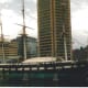 The USS Constellation, foreground, The World Trade Center in Baltimore, the Pratt Street Pavilion in the background.