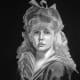 4B pencil darkening the darks and background. A little white on the highlights