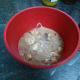 Pouring the mixture into a bowl which is then placed in the fridge for a few hours to set