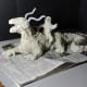 I created a clay model of the dragon and boy to help with placement of shadows. Sometimes this helps the drawing process.