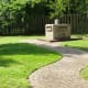 Paved path to the Tri-County Marker in Thomas Park