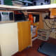 Old Ikea desk in its new location, making the storage under the main desk better organised