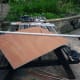 Cutting the plywood to size and shape to make the folding doors