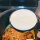 To make toffee sauce: In a pan, combine brown sugar, heavy cream, and 4 tablespoons butter. Bring to boil over medium heat.