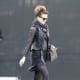 Kate in a short skirt, stockings and knee high heel boots running errands. She is a perfect street style celebrity.