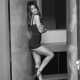 Black and white photoshoot in lingerie and high heels. She really has perfect shapely legs