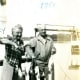 George and Minn Hibbard holding fish caught at their lodge in Ely, Minnesota.