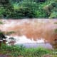 BOILING LAKE in Manito: just 40 km east of Legazpi City - the iron-rich brown, hot water emitting smoke - a delight to watch but a dangerous one. Better cook an egg on it! (Photo courtesy of http://byaherosnapshots.blogspot.com/)