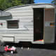 Shasta vintage exterior before paint, polish & new hubs.